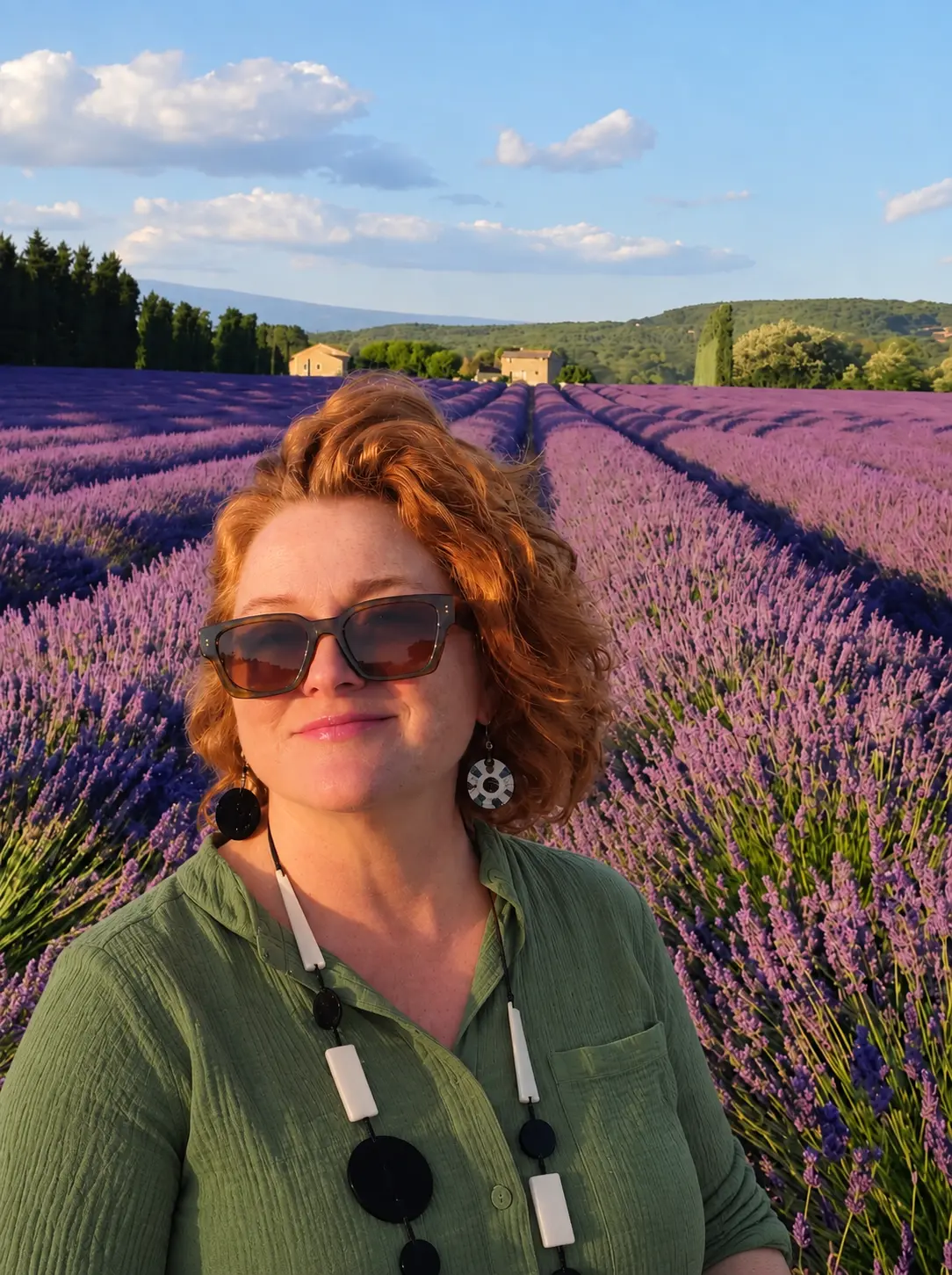 Jamie Leigh standing in a blooming lavender field in Provence, France